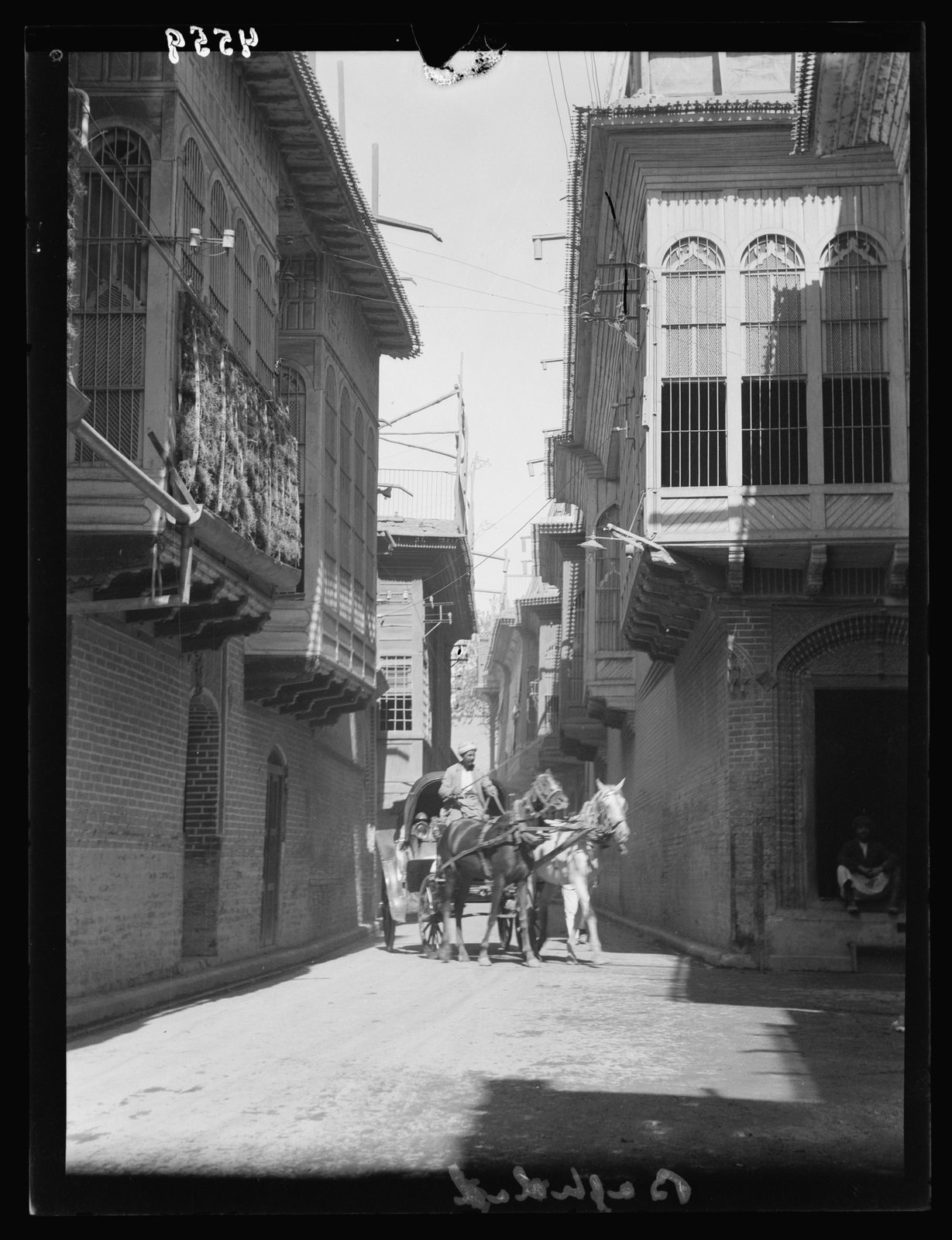 Baghdad street and overhanging balconies, 1932